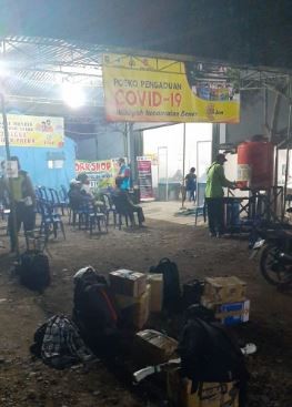 PEMERIKSAAN DI POSKO TERHADAP PEMUDIK DARI JAMBI YANG PULANG KE PURWOREJO